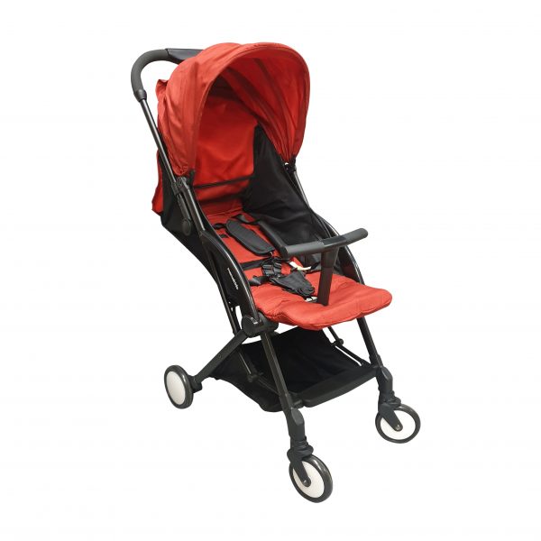 red pushchair with black handle and basket